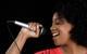 Woman singing with a microphone