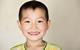 Asian boy smiling